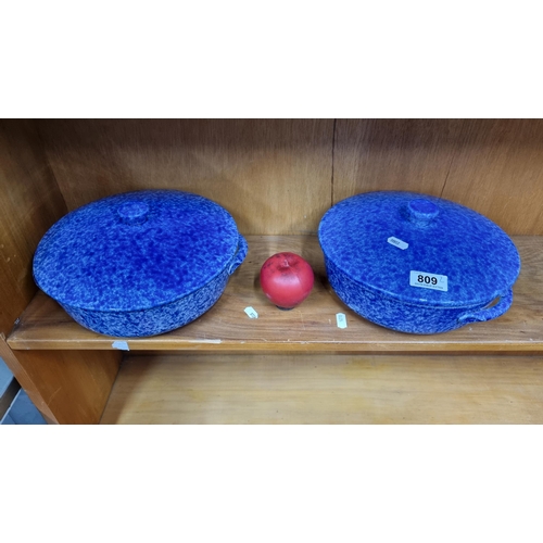 809 - Two charming blue and white glazed Coche Stoneware lidded casserole dishes. In very good condition.