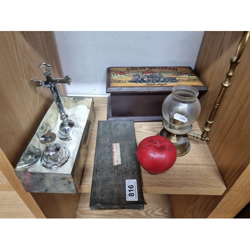 816 - Three interesting items including a brass genie oil lamp, a wooden storage box and a communion set.