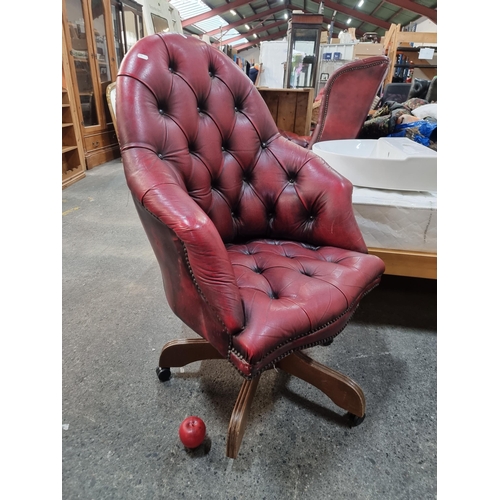 840 - Star Lot : A very stylish Chesterfield style swivel office chair buttonback detailing. In an attract... 