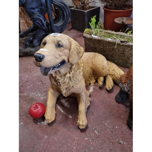 850 - A very sweet and heavy reconstituted stone garden sculpture of a golden retriever dog in a bright an... 