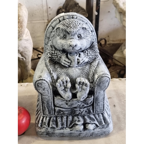 856 - An adorable and heavy reconstituted stone garden sculpture of a little hedgehog all tucked up in a c... 