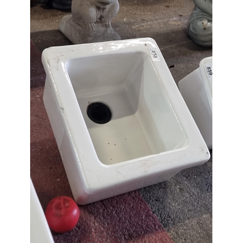 858 - A neatly sized vintage rectangular Belfast sink with drain fitting to base. W33cm x L28cm x D17cm.Do... 