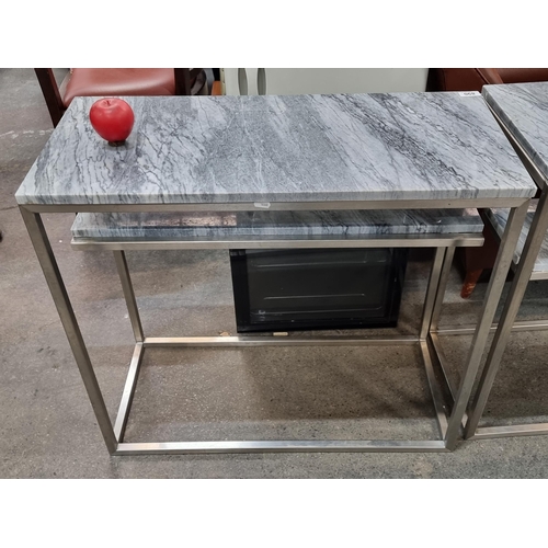 890 - Star lot : A sleek console table with grey marble top and shelf. Ideal for living spaces or commerci... 