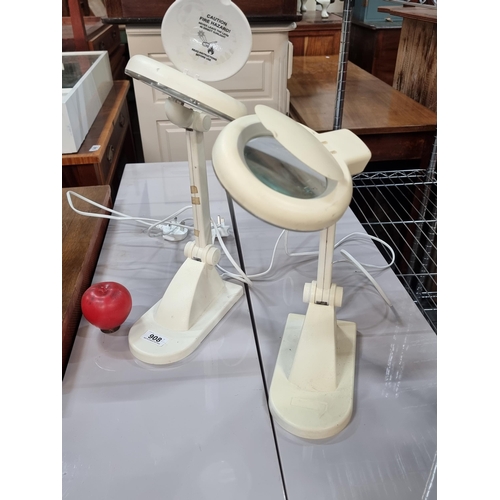 908 - A pair of Naturalight magnifying table lamps, model D/EN1040. Fitted with three pin plugs. Great for... 