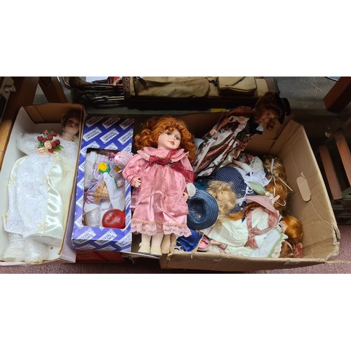 366 - An impressive collection of approx. 15 beautiful dolls with porcelain examples dressed in ornate gar... 