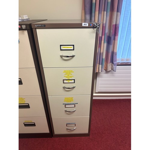 402 - Two Four Drawer File cabinets, inc a Bisley both with keys. (you are getting lot 401 and 402 in this... 