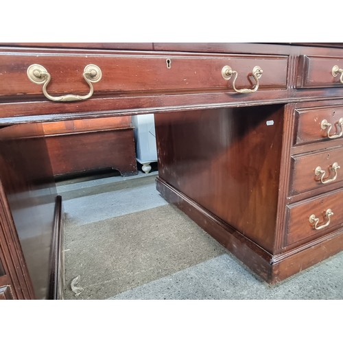 838 - Super Star Lot: A very handsome and large early 20th century partners pedestal desk featuring 9 draw... 