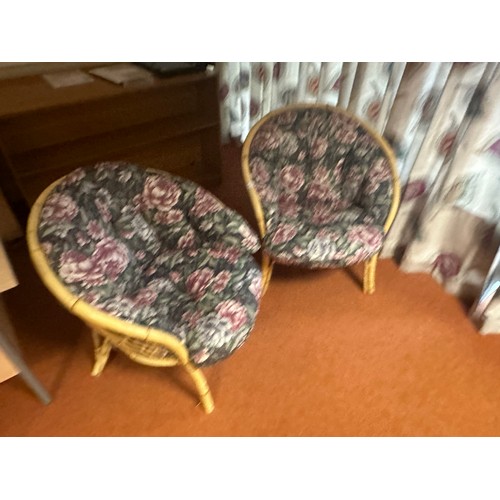 413 - A nice pair of round cane / bamboo chairs with clean cushions.
 There is only two opportunities to c... 