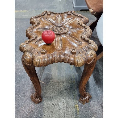 574 - Star lot : A magnificent pair of baroque armchairs carved in a scallop form along with matching side... 