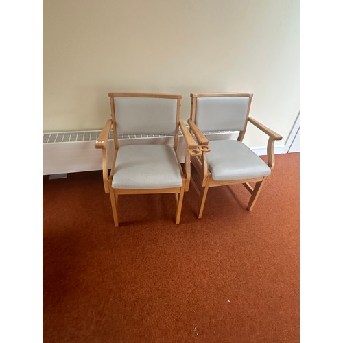 419 - A good pair of Mid century chairs with Lift up seals for storage. Nice golden oak colour to the wood... 