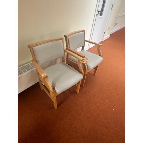 419 - A good pair of Mid century chairs with Lift up seals for storage. Nice golden oak colour to the wood... 