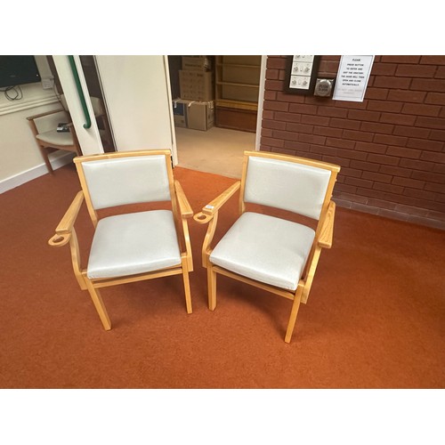 420 - A good pair of Mid century chairs with Lift up seals for storage. Nice golden oak colour to the wood... 