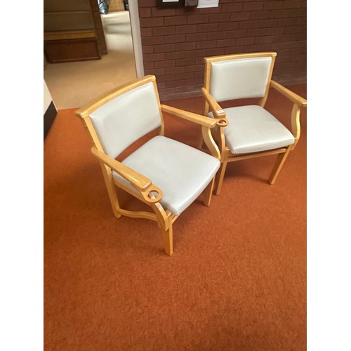 420 - A good pair of Mid century chairs with Lift up seals for storage. Nice golden oak colour to the wood... 