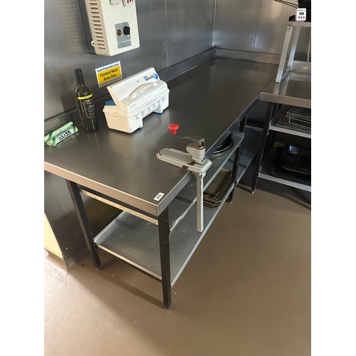 470 - Star lot : A two meter Stainless Steel prep table, with gallery back, storage below and a commercial... 