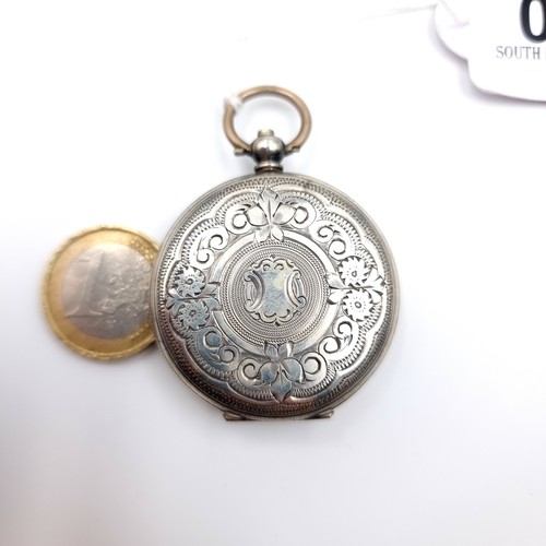 16 - A white enamel dialled silver pocket watch set with roman numeral figures with a blank cartouche to ... 