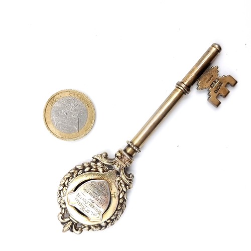 17 - Star lot : A Sterling Silver presentation key presented to James Everett minister for posts and tele... 