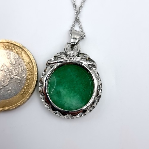 26 - A very pretty Sterling Silver and Jade Pendent 44cm long.