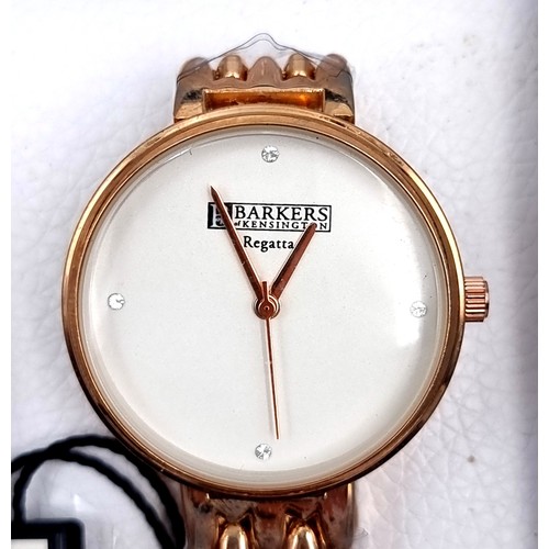 28 - A Barkers of Kensington Globenfeld quartz dress wristwatch with gold tone bracelet, watch in New con... 