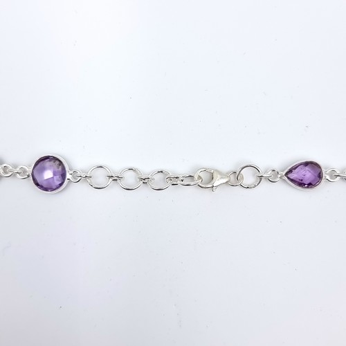 39 - A super suite of amethyst stone jewellery consisting of a silver mounted necklace, length 60cm, toge... 