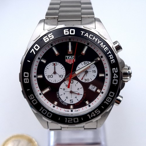 666 - Star Lot : A Tag Heuer Swiss chronograph Formula 1 watch set in original box with papers and guarant... 