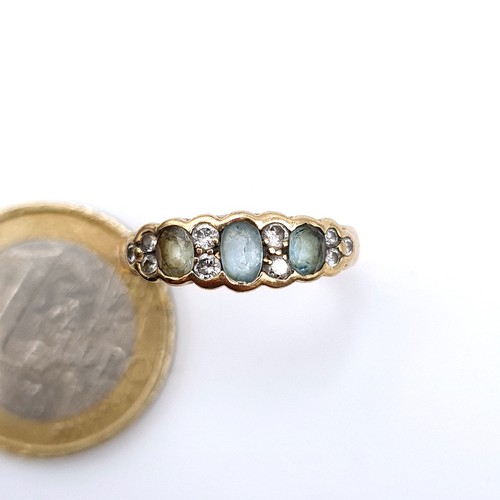 668 - Star lot : A good example of a 9K gold (375) aquamarine and diamond ring, size O, weight 2 grams.