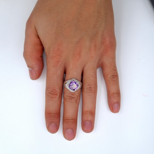 678 - A fine example of an amethyst gemstone gem set ring set in sterling silver, size O, weight 5.36 gram... 