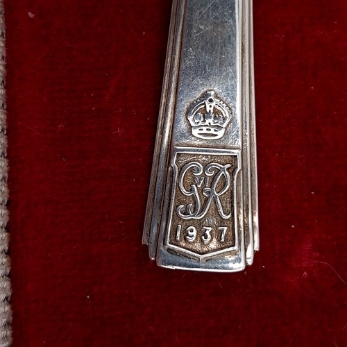 683 - A sterling silver preserved spoon hallmarked 1936 with a cipher to spoon finial stating GR 1937, len... 