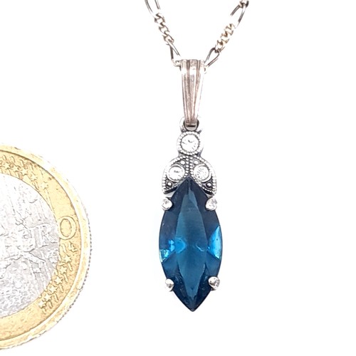 688 - A vintage Sterling Silver blue topaz gemstone pendant necklace and chain, length of chain 40cm.