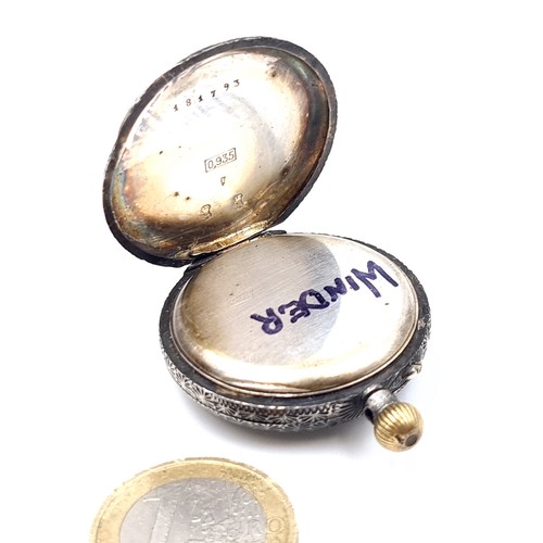 691 - A Ladies Sterling Silver fob pocket watch set with profuse decoration to case with roman numeral dia... 