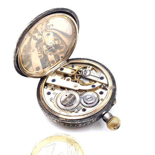 691 - A Ladies Sterling Silver fob pocket watch set with profuse decoration to case with roman numeral dia... 