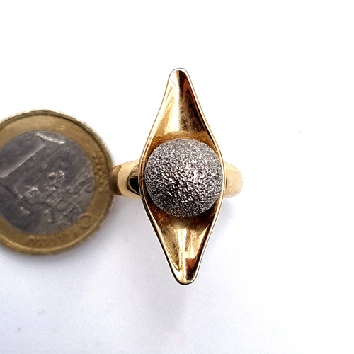 710 - An unmarked gold ring (probably 9K), set with a ball cluster diamond set ring, ring size O, weight 6... 