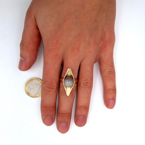 710 - An unmarked gold ring (probably 9K), set with a ball cluster diamond set ring, ring size O, weight 6... 