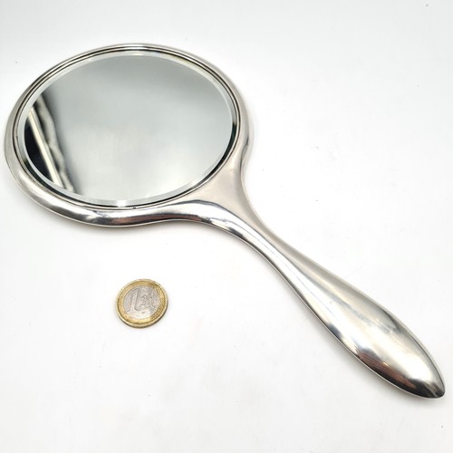 727 - A beautiful Art Deco Sterling Silver  hand Mirror, with sterling silver back hallmarked Birmingham 1... 