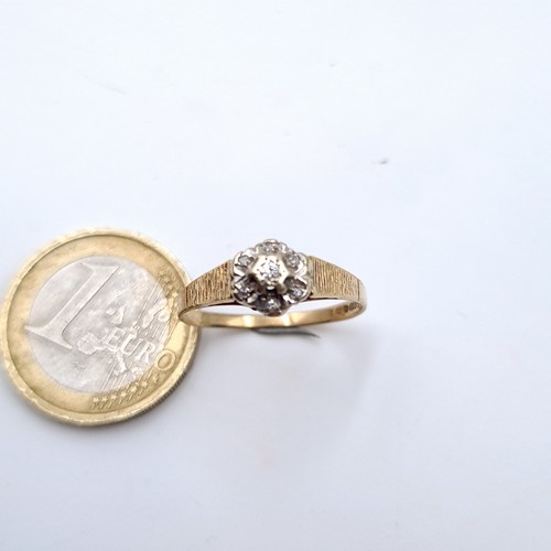 728 - A 9K gold (375) illusion set diamond ring, size Q, weight 1.75 grams.