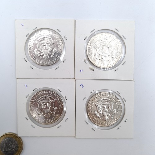 735 - A collection of mint silver content Kennedy silver half dollars, set in original mounts dated 1965,6... 