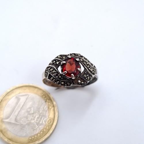 739 - A nice example of an art deco  garnet stone vintage sterling silver ring with a twist set marcasite ... 