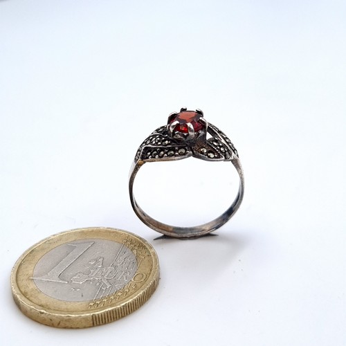 739 - A nice example of an art deco  garnet stone vintage sterling silver ring with a twist set marcasite ... 