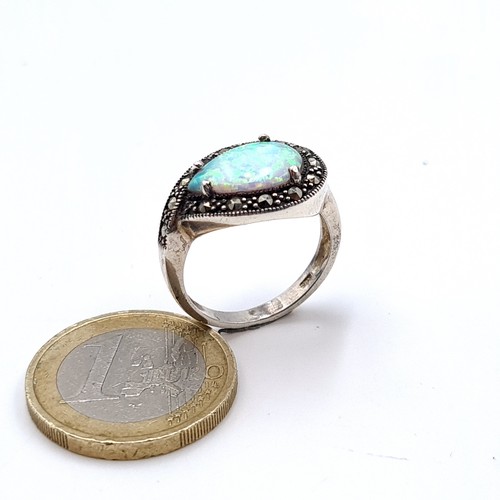 741 - A pretty art deco Opal tear drop stone ring set with marcasite surround set in sterling silver, ring... 