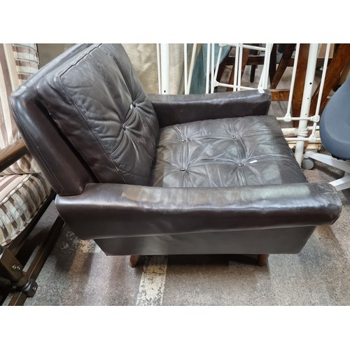 622 - Star Lot : A gorgeous vintage Mid century elegant and comfortable lounge chair in original black pad... 