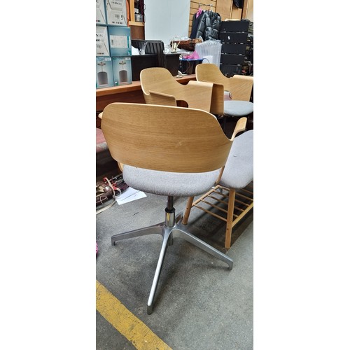 369 - Star Lot : A set of 3 Fjallberget chairs with swivel seats and adjustable height. Seat upholstered i... 