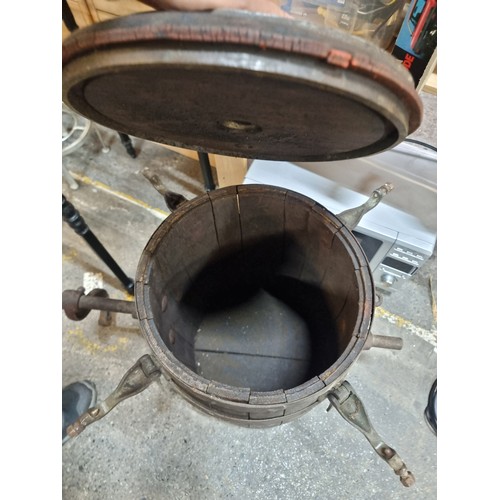 608 - A fabulous antique butter churn barrel with metal hardware.