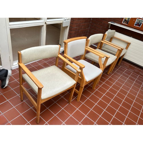 496 - Four good mid century chairs including Parker Knoll examples and ones with lift up seats for storage... 