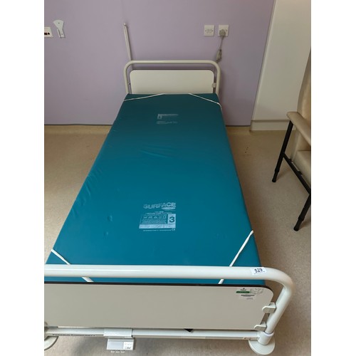 529 - Star Lot :  A commercial quality Cream metal electric remote control hospital bed  made from cast me... 