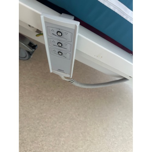 537 - Star Lot :  A commercial quality Cast metal electric remote control hospital bed with a Commercial s... 