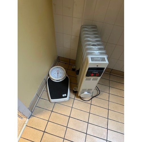 549 - An oil filled heater and a good quality Seca Scale. There is only two opportunities to collect from ... 