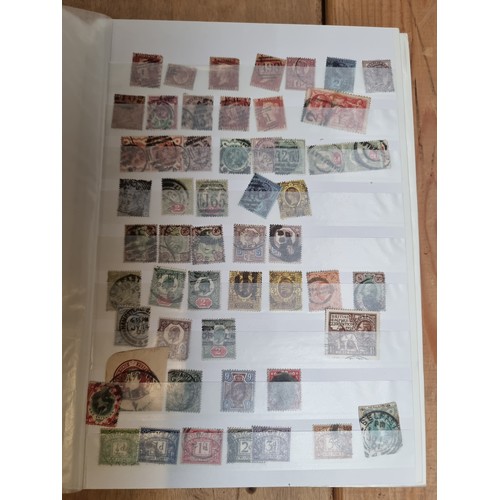 223 - A stamp album containing 32 pages with mainly English stamps including examples depicting Queen Vict... 