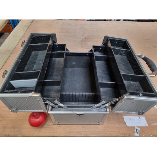 397 - A good quality Fortress Professional hard shell make up case. With interior Trays.