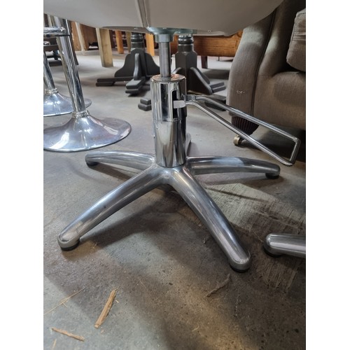 893 - Star Lot : Three matching Hydraulic Hair cutting Station chairs. All in good working order. Approx €... 