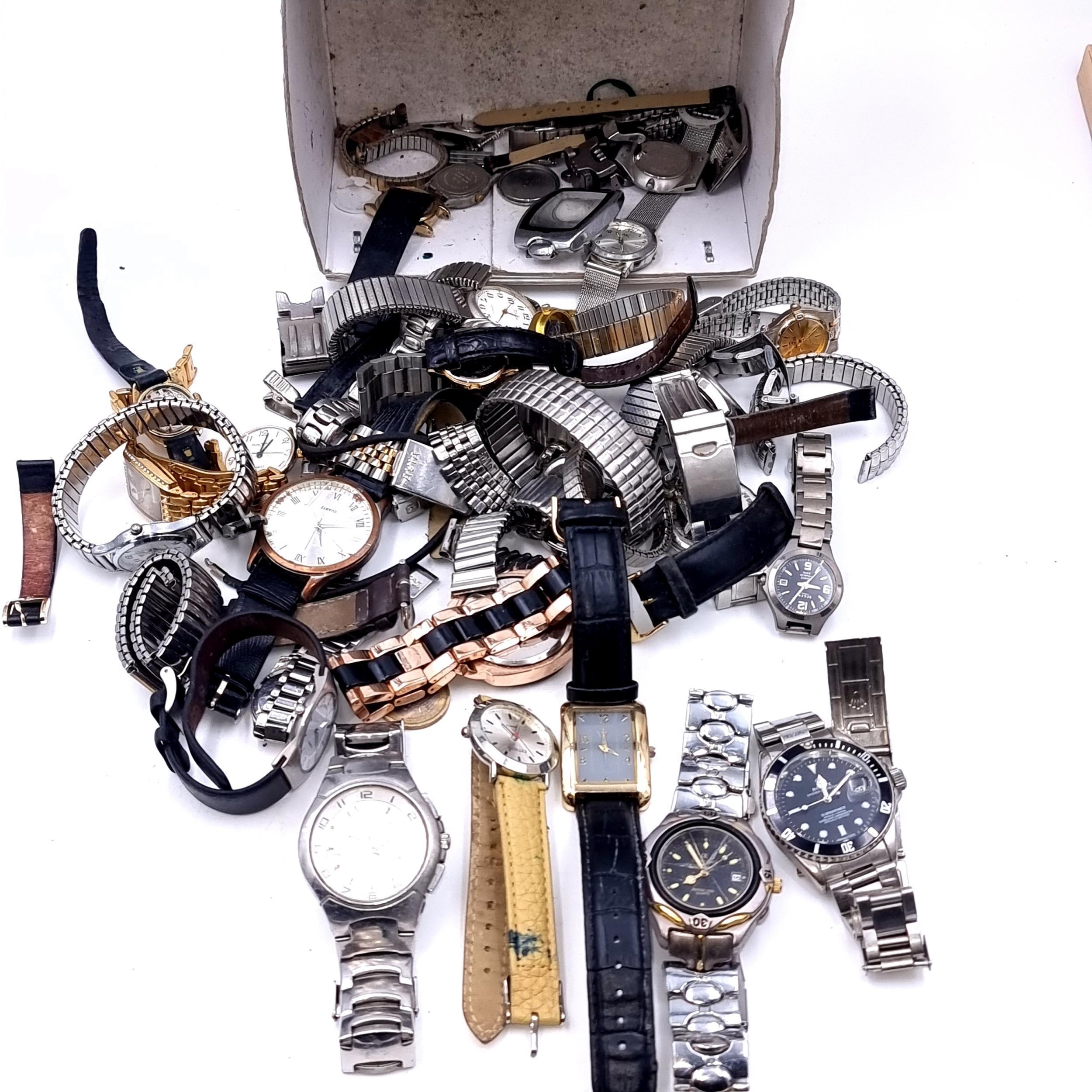 An extremely large collection of watches with some branded examples ...