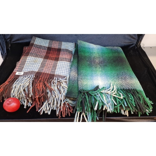 101 - Two large vintage Irish wool blankets including a Connemara example and another from Marvel Rug. Fea... 